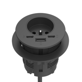 Prise circulaire noire avec deux connexions USB-C, un chargeur USB-A et une prise 230V. Prise d'alimentation dissimulée sous le cadre circulaire.  