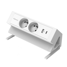 Unité d'alimentation rectangulaire blanche longue avec deux ports 230V et deux connexions USB. L'unité est inclinée à 45° et équipée d'une pince en dessous pour la fixer à un bureau.  