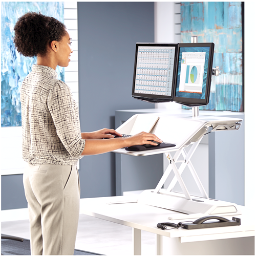 Lotus™ Single Monitor Arm__00099_lotus_lifestyle_standing_a.png