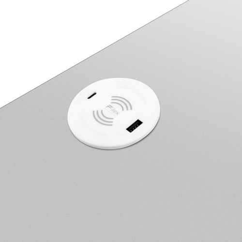 Plaque de charge sans fil circulaire blanche avec un port de charge USB filaire sur chaque bord ; logo sans fil blanc au centre.  