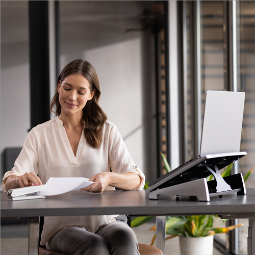 Office Suites™ Laptop Riser__8032001-5011401-5011402-Bobs-Office-Stapler-with-Model-12.png