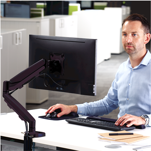 Eppa™ Single Monitor Arm - Black__9683101_Eppa_MonitorArm_Black_Single_LS_Person2_INSET.png