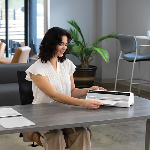 Saturn A4 Small Office Laminator__Saturn_A4_LS_Model_Laminating_1.png